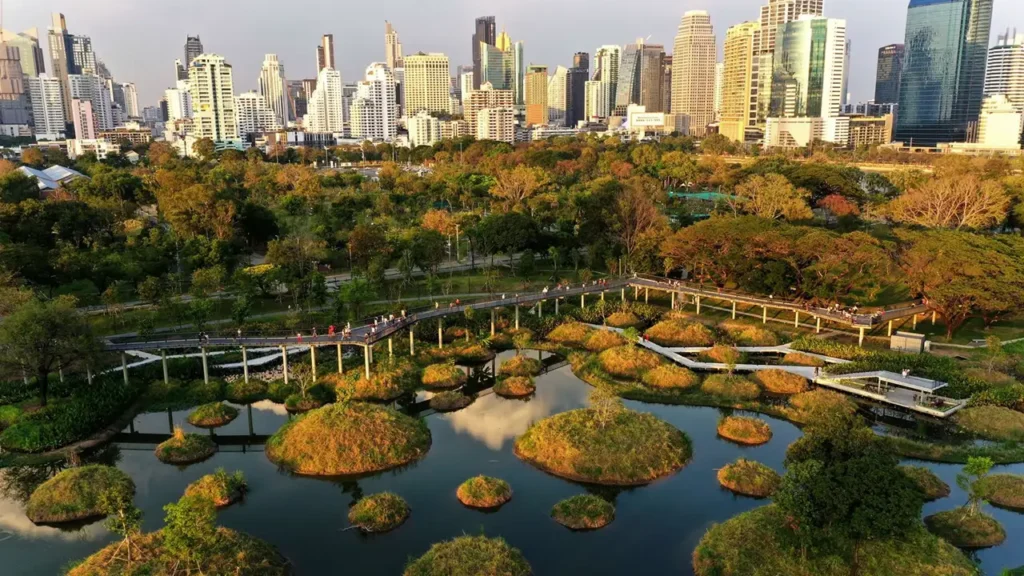 Ilustração de uma Cidade Esponja com jardins de chuva absorvendo água da tempestade