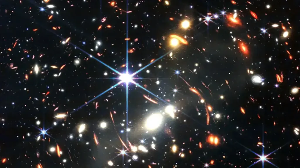 Galáxias primordiais observadas pelo James Webb desafiando a cronologia da Idade do Universo.